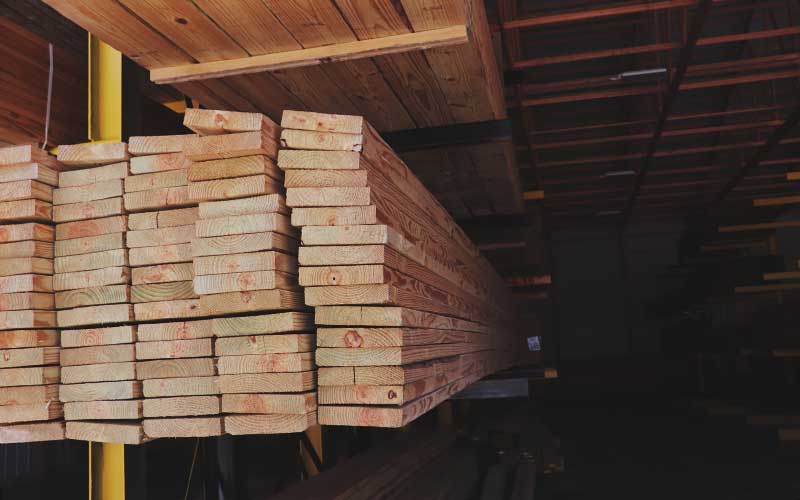 Pile of lumber in lumber yard