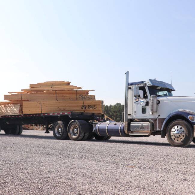 Semi Truck with wood and trusses