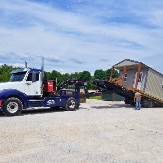 Truck dropping of Cabin Style Shed